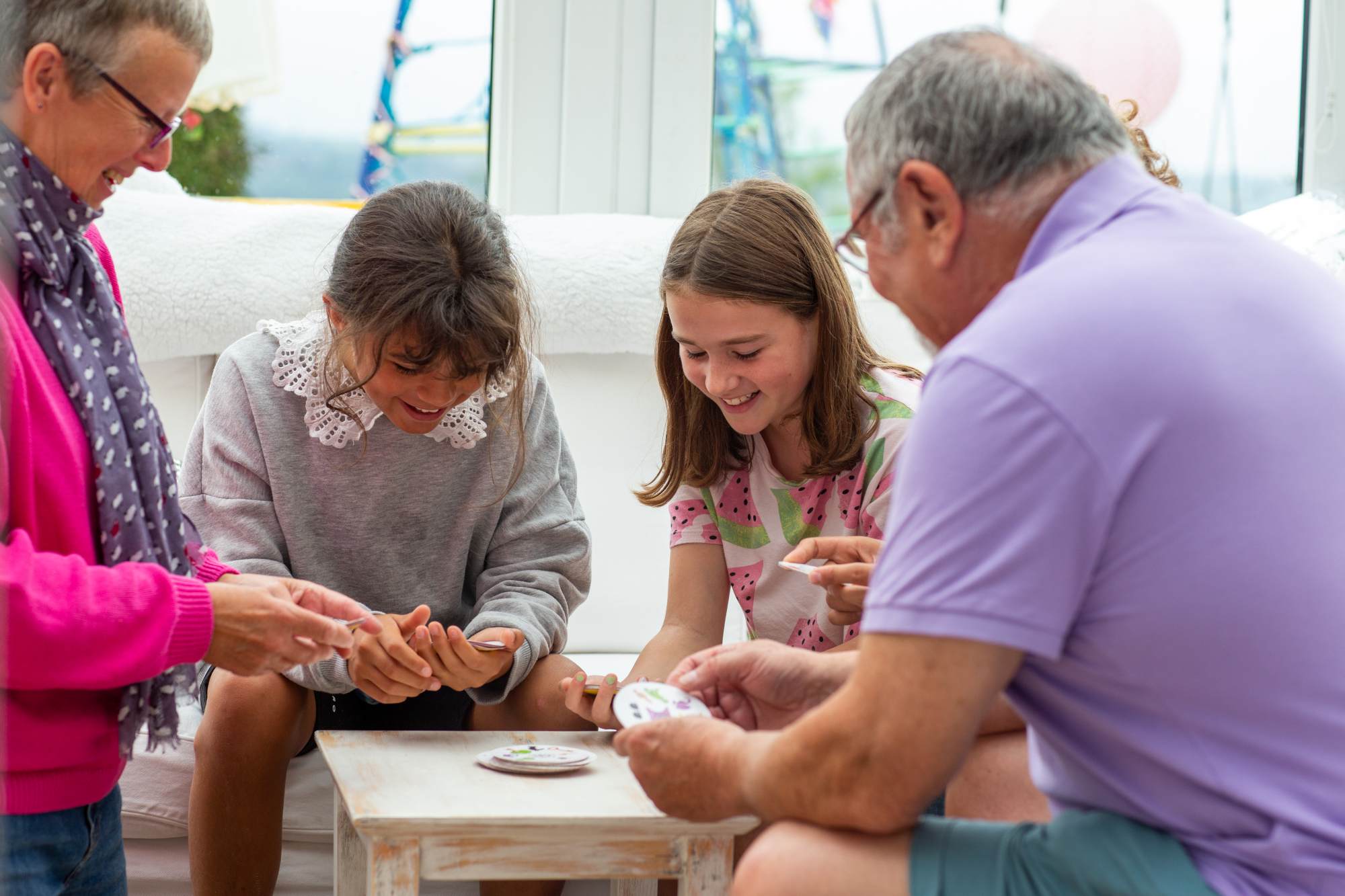 A family laughing together and playing games